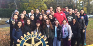 Students from Great Neck North High School volunteered their time to a turkey drive help families in need have a Thanksgiving dinner.