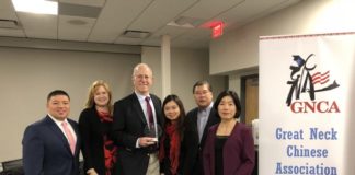 The Great Neck Chinese Association honored Lawrence Gross, a former trustee of the Great Neck Board of Education, with an award for lifetime achievement on Monday. (Photo courtesy of the Great Neck Chinese Association)