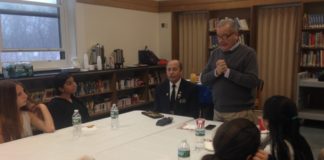 Richard S. Sherman Great Neck North Middle School students listen to wartime stories told by Commander of the Albertson VFW Post 5253 Jack Hirsch and Assemblyman Anthony D’Urso. (Photo courtesy of Assemblyman Anthony D'Urso's office)