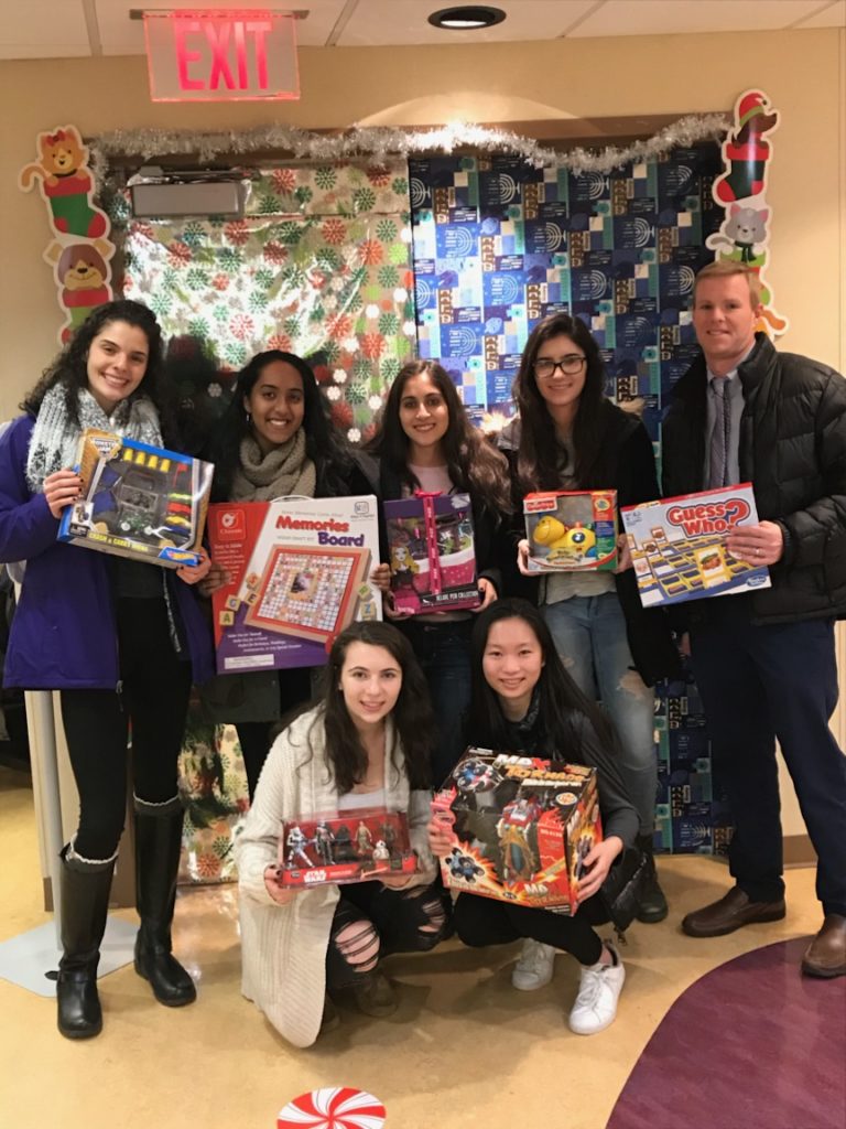 Herricks High School Youth Against Cancer holds holiday toy drive