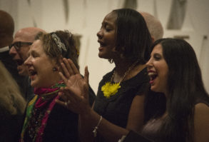 Members of the interfaith choir danced, sang and clapped together in celebration and song. (Photo by Janelle Clausen)