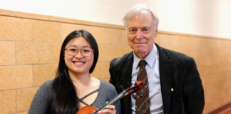 North High violist Megan Xu, chosen for the Honor Orchestra of America, and Mr. Joseph Rutkowski, director of instrumental music at North High. (Photo courtesy of the Great Neck Public Schools)