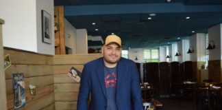 Barney Villalona, the new manager of Element Seafood, said he hopes to add to a quality seafood restaurant. (Photo by Janelle Clausen)