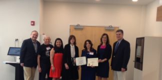 Board of Trustees members Robert Schaufeld and Joel Marcus, Councilwoman Anna Kaplan, Councilwoman Lee Seeman, Library Director Denise Corcoran, Legislator Ellen Birnbaum, and Assistant Superintendent for Secondary Education, Great Neck Public Schools, Stephen Lando atttended the Great Neck Library ribbon cutting for the new RFID self checkout . (Photo courtesy of the Great Neck Library)