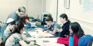 Students at the Lake Success Jewish Center are guided through an art project. (Photo courtesy of the Lake Success Jewish Center Hebrew School)