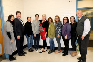 Assistant Principal Luciana Bradley, Joseph Hickey, assistant superintendent for special education and pupil services, Robin Portnoy, Matthew Portnoy, art teacher Rosemary Sloggatt, Moji Pourmoradi, parent co-chair of the Shared Decision Making Committee, Robin Trichon, teacher co-chair of the committee, Alison Brennan, director of special education, Jordana Levine, parent co-chair of the committee and interim Principal Michael Mensch were all involved in the project. (Photo courtesy of the Great Neck Public Schools)