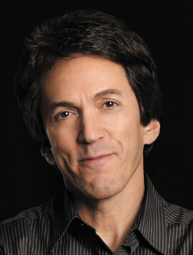 Author Mitch Albom started writing in New York, then ventured into the afterlife