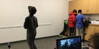 Teens trying out the virtual reality relaxation environment created by Team Dream at Levels. (Photo courtesy of the Great Neck Library)