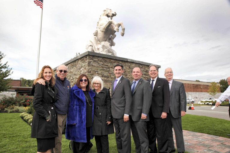 Town officials celebrate rededication of Horse Tamer Statue