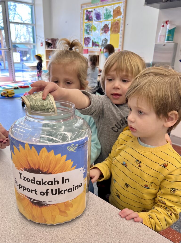 Preschool students stand with Ukraine