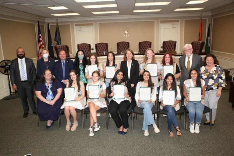 Town officials celebrate local Girls Scouts for earning gold award