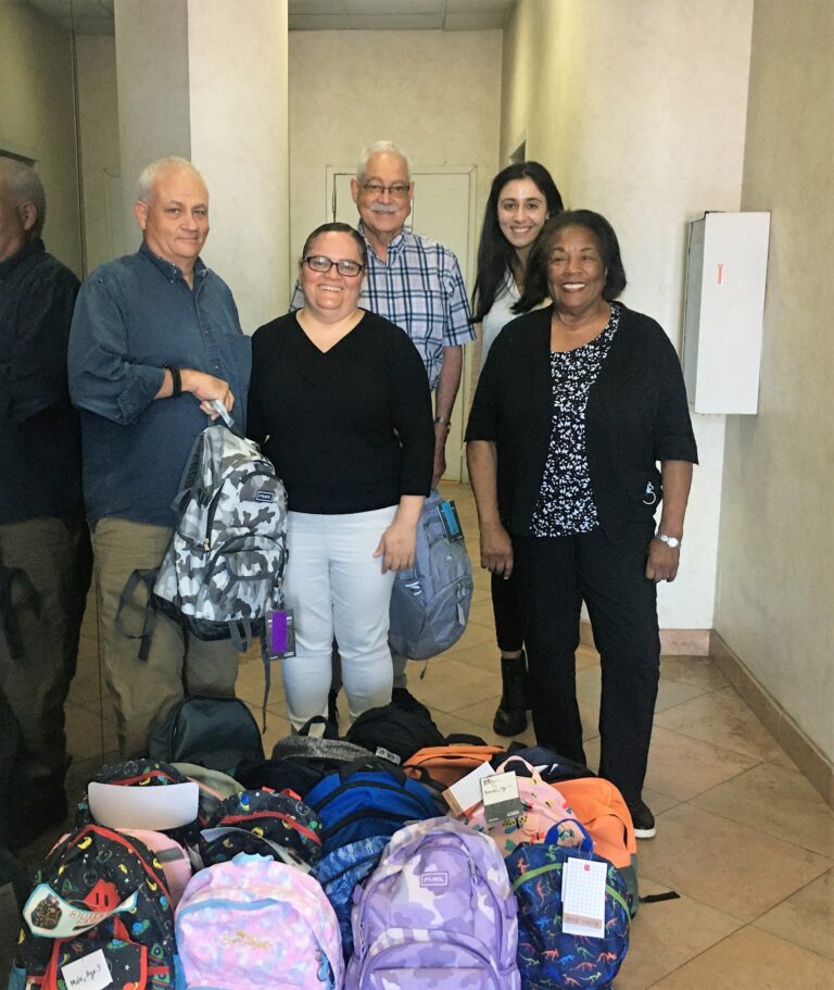 Long Island Reach donates backpacks to children and families in need in time for the school yea