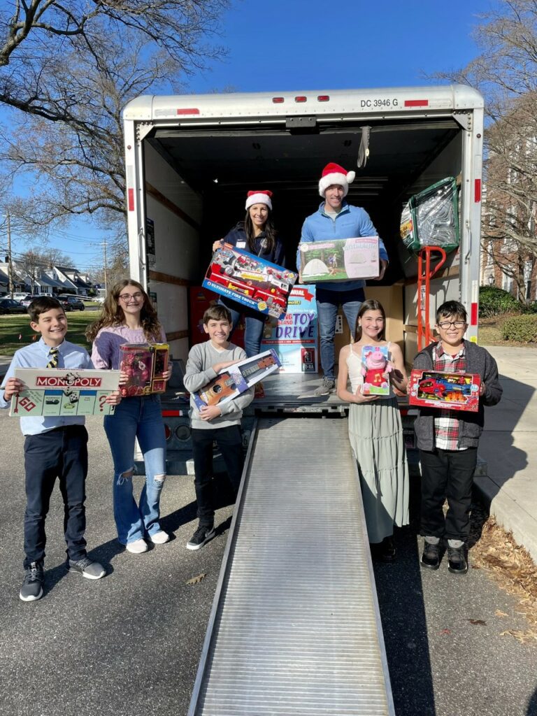 Mineola learners display generous spirit with holiday toy drives