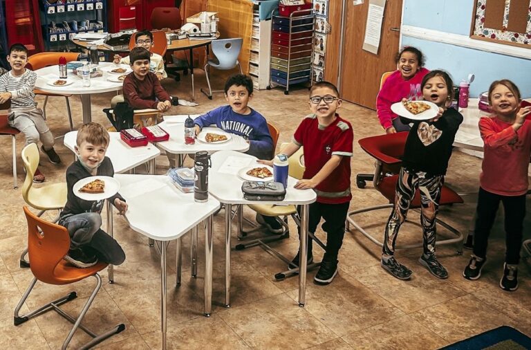 Mineola first graders rewarded with pizza party for exceptional work on Spanish literacy program