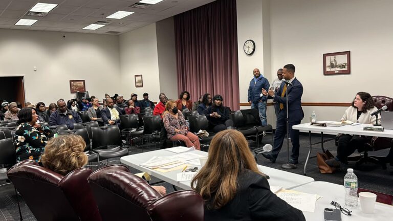 Legislator Solages, community residents demand restoration of early voting at Elmont Memorial Library   